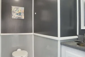 Toilet and sink inside 2 Station Restroom Trailer