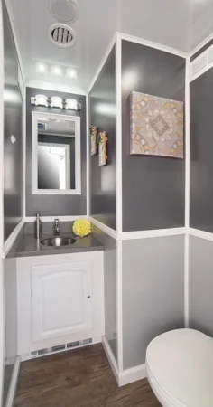 4 Station Restroom Trailer - Sink and toilet view