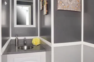 4 Station Restroom Trailer - Sink and toilet view