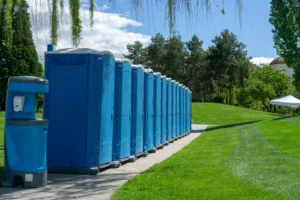 A portable toilet is strategically placed at an Akron, Ohio, event following best practices for comfort and safety